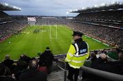 24 February 2007; A Garda patrols the Davin stand. RBS Six Nations Rugby Championship, Ireland v England, Croke Park, Dublin. Picture Credit: Ray McManus / SPORTSFILE