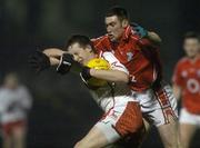 24 February 2007; Colm Cavanagh, Tyrone, in action against Noel O'Leary, Cork. Allianz National Football League, Division 1A, Round 3, Cork v Tyrone, Pairc Ui Rinn, Cork. Picture Credit: Pat Murphy / SPORTSFILE