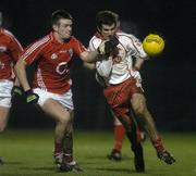 24 February 2007; Justin McMahon, Tyrone, in action against Derek Kavanagh, Cork. Allianz National Football League, Division 1A, Round 3, Cork v Tyrone, Pairc Ui Rinn, Cork. Picture Credit: Pat Murphy / SPORTSFILE