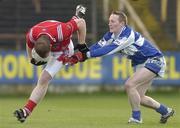 25 February 2007; Mark Stanfield, Louth, in action against Peter O'Leary, Laois. Allianz National Football League, Division 1B, Round 3, Laois v Louth, O'Moore Park, Portlaoise, Co. Laois. Photo by Sportsfile *** Local Caption ***