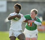 25 February 2007;  Maggie Alphonsi, England, is tackled by Jeannette Feighery, Ireland. Women's Six Nations Rugby, Ireland v England, Thomond Park, Limerick. Picture Credit: Kieran Clancy / SPORTSFILE