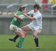 25 February 2007; Jo O'Sullivan, Ireland, is tackled by Katy Mclean, England. Women's Six Nations Rugby, Ireland v England, Thomond Park, Limerick. Picture Credit: Kieran Clancy / SPORTSFILE