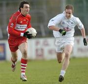 25 February 2007; Kevin McGuckin, Derry, in action against Mark Scanlon, Kildare. Allianz National Football League, Division 1B, Round 3, Kildare v Derry, St Conleth's Park, Newbridge, Co. Kildare. Picture Credit: Brian Lawless / SPORTSFILE