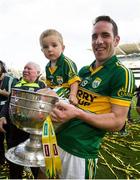 21 September 2014; Declan O'Sullivan, Kerry celebrates with his son Ollie, age 2, and the Sam Maguire cup, at the end of the game. GAA Football All Ireland Senior Championship Final, Kerry v Donegal. Croke Park, Dublin. Picture credit: David Maher / SPORTSFILE
