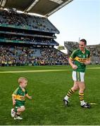 21 September 2014; Kerry's Declan O'Sullivan celebrates with his son Ollie, aged 2, after the game. GAA Football All Ireland Senior Championship Final, Kerry v Donegal. Croke Park, Dublin. Picture credit: Piaras Ó Mídheach / SPORTSFILE