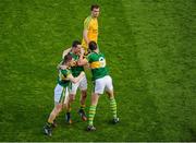 21 September 2014; Kerry players, left to right, Kieran O'Leary, Shane Enright, and David Moran celebrate as Éamonn McGee, Donegal walks off dejectedly. GAA Football All Ireland Senior Championship Final, Kerry v Donegal. Croke Park, Dublin. Picture credit: Dáire Brennan / SPORTSFILE