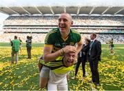 21 September 2014; Kerry's Kieran Donaghy is lifted by Barry John Keane following their victory. GAA Football All Ireland Senior Championship Final, Kerry v Donegal. Croke Park, Dublin. Picture credit: Stephen McCarthy / SPORTSFILE