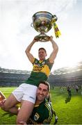 21 September 2014; Kerry joint captain Kieran O'Leary celebrates with the Sam Maguire cup as he is lifted shoulder-high by Bryan Sheehan. GAA Football All Ireland Senior Championship Final, Kerry v Donegal. Croke Park, Dublin. Picture credit: David Maher / SPORTSFILE