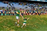 21 September 2014; Kerry's Declan O'Sullivan celebrates with his son Ollie, aged 2, after the game. GAA Football All Ireland Senior Championship Final, Kerry v Donegal. Croke Park, Dublin. Picture credit: Brendan Moran / SPORTSFILE