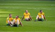 21 September 2014; Donegal players, Dermot Molloy, Anthony Thompson, Colm Anthony McFadden and Christy Toye, sit on the pitch after the game. GAA Football All Ireland Senior Championship Final, Kerry v Donegal. Croke Park, Dublin. Picture credit: Ray McManus / SPORTSFILE