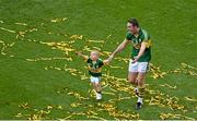 21 September 2014; Declan O'Sullivan, Kerry, and his son Ollie, aged 2, celebrate after the game. GAA Football All Ireland Senior Championship Final, Kerry v Donegal. Croke Park, Dublin. Picture credit: Dáire Brennan / SPORTSFILE