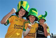 21 September 2014; Donegal supporters and cousins, left to right, Mark Sproule, aged 11, from Ballybofey, Co. Donegal, Matthew Sproule, aged 12, from Castlefin, Co. Donegal, and Adam Sproule, aged 10, from Ballybofey, on their way to the game.  GAA Football All Ireland Senior Championship Final, Kerry v Donegal. Croke Park, Dublin. Picture credit: Dáire Brennan / SPORTSFILE
