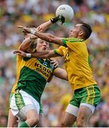 21 September 2014; Kieran Donaghy, Kerry, in action against Leo McLoone, left, and Karl Lacey, Donegal. GAA Football All Ireland Senior Championship Final, Kerry v Donegal. Croke Park, Dublin. Picture credit: Piaras Ó Mídheach / SPORTSFILE