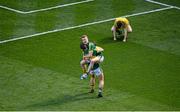 21 September 2014; Kerry players Ivan Parker, left, and Robert Wharton celebrate as Donegal player Lorcán Connor lies in dejection on the pitch after the game. Electric Ireland GAA Football All Ireland Minor Championship Final, Kerry v Donegal. Croke Park, Dublin. Picture credit: Dáire Brennan / SPORTSFILE
