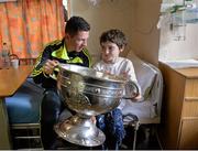 22 September 2014; Gary Monaghan, aged 13, from Navan, with Kerry player Kieran O'Leary, during a visit by the All Ireland Senior Football Champions 2014 to Our Lady's Children Hospital. Our Lady's Children Hospital, Crumlin, Dublin. Picture credit: Piaras Ó Mídheach / SPORTSFILE