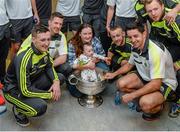 22 September 2014; Ryan Dwhurst, aged 6 months, and his mother Daniele O'Brien, from Killarney, meet Kerry players with the Sam Maguire Cup, during a visit by the All Ireland Senior Football Champions 2014 to Our Lady's Children Hospital. Our Lady's Children Hospital, Crumlin, Dublin. Picture credit: Piaras Ó Mídheach / SPORTSFILE