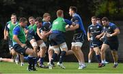 22 September 2014; Leinster's Kane Douglas is tackled by Ross Molony during squad training ahead of Friday's Guinness Pro 12, Round 4, match against Cardiff Blues. UCD, Dublin. Picture credit: Stephen McCarthy / SPORTSFILE