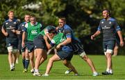 22 September 2014; Leinster's Cian Kelleher is tackled by Sean McCarthy, left, and Jack Conan, right, during squad training ahead of Friday's Guinness Pro 12, Round 4, match against Cardiff Blues. UCD, Dublin. Picture credit: Stephen McCarthy / SPORTSFILE