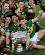 21 September 2014; Kerry players, including Aidan O'Mahony, Killian Young and James O'Donoghue celebrate with the Sam Maguire after the game. GAA Football All Ireland Senior Championship Final, Kerry v Donegal. Croke Park, Dublin. Picture credit: Piaras Ó Mídheach / SPORTSFILE