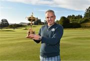 23 September 2014; European team captain Paul McGinley with the Ryder Cup, during the European team photograph. Previews of the 2014 Ryder Cup Matches. Gleneagles, Scotland. Picture credit: Matt Browne / SPORTSFILE