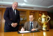 22 February 2007; Niall Cogley, right, Chief Executive of Setanta Sports Ireland, watched by Dr. Syd Millar, Chairman of the IRB Board, at the signing of the contract between Setanta Sports Ireland and the IRB to show live coverage of all matches from the 2007 and 2011 Rugby World Cups. Setanta Sports will be the only place where Irish rugby fans can see live, full match coverage of all 48 games from the 2007 and 2011 tournaments. IRB Headquarters, Huguenot House, St Stephen’s Green, Dublin. Picture credit: Brendan Moran / SPORTSFILE