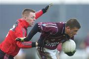 25 February 2007; Alan Mangan, Westmeath, in action against Stephen Toner, Down. Allianz National Football League, Division 1B, Round 3, Westmeath v Down, Cusack Park, Mullingar, Co. Westmeath. Picture Credit: David Maher / SPORTSFILE