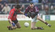 25 February 2007; Alan Mangan, Westmeath, in action against Darren Cunningham, Down. Allianz National Football League, Division 1B, Round 3, Westmeath v Down, Cusack Park, Mullingar, Co. Westmeath. Picture Credit: David Maher / SPORTSFILE