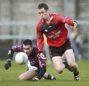 25 February 2007; David Duffy, Westmeath, in action against Darren Cunningham, Down. Allianz National Football League, Division 1B, Round 3, Westmeath v Down, Cusack Park, Mullingar, Co. Westmeath. Picture Credit: David Maher / SPORTSFILE
