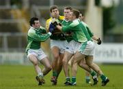 25 February 2007; Eamonn Fitzmaurice, Kerry, in action against, from left, Ciaran O'Reilly, James Sherry and Martin McGrath, Fermanagh. Allianz National Football League, Division 1A, Round 3, Fermanagh v Kerry, Kingspan Breffni Park, Cavan. Picture Credit: Brendan Moran / SPORTSFILE