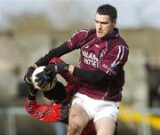 25 February 2007; David Duffy, Westmeath, in action against John Clarke, Down. Allianz National Football League, Division 1B, Round 3, Westmeath v Down, Cusack Park, Mullingar, Co. Westmeath. Picture Credit: David Maher / SPORTSFILE