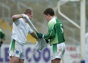 25 February 2007; Fermanagh goalkeeper Christopher Breen gives his goalkeeper jersey to team-mate Shane McDermott after being shown a straight red card by referee Michael Hughes. Allianz National Football League, Division 1A, Round 3, Fermanagh v Kerry, Kingspan Breffni Park, Cavan. Picture Credit: Brendan Moran / SPORTSFILE