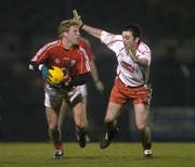24 February 2007; Anthony Lynch, Cork, in action against Ryan Mellon, Tyrone. Allianz National Football League, Division 1A, Round 3, Cork v Tyrone, Pairc Ui Rinn, Cork. Picture Credit: Pat Murphy / SPORTSFILE