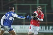 25 February 2007; Mark Brennan, Louth, in action against Darren Rooney, Laois. Allianz National Football League, Division 1B, Round 3, Laois v Louth, O'Moore Park, Portlaoise, Co. Laois. Photo by Sportsfile