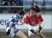 25 February 2007; Shane Lennon, Louth, in action against Cathal Ryan, Laois. Allianz National Football League, Division 1B, Round 3, Laois v Louth, O'Moore Park, Portlaoise, Co. Laois. Photo by Sportsfile *** Local Caption ***