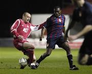 26 February 2007; Joseph Ndo, St Patrick's Athletic, in action against Peter Kennedy, Portadown. Setanta Cup Group 2, St Patrick's Athletic v Portadown, Richmond Park, Dublin. Picture credit: Brendan Moran / SPORTSFILE