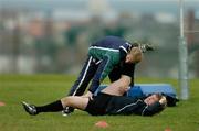 27 February 2007; Ireland's Jerry Flannery gets some assistance from team physiotherapist Brian Green during squad training. Ireland Rugby Training, St Gerard's School, Bray, Co. Wicklow. Picture credit: Brendan Moran / SPORTSFILE