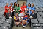 23 September 2014; In attendence at a photocall ahead of the TG4 All-Ireland Junior, Intermediate and Senior Ladies Football Championship Finals on Sunday next, are, back, from left, Intermediate Finalists Kyla Trainor and Niamh McGowan, Down with Aisling Moane and Marita McDonald, Fermanagh and the Mary Quinn Memorial Cup, Vera Foley and Roisin Phelan, Cork with Sinead Goldrick and Carla Rowe, Dublin and the Brendan Martin Cup and front, from left, Pádhraic Ó Ciardha, TG4, Junior Finalists, Carla Donnelly, left, Wexford, and Alisha Jordan, New York, with the West County Hotel Cup and Pat Quill, President, Ladies Gaelic Football Association. Croke Park, Dublin. Picture credit: Brendan Moran / SPORTSFILE