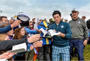 23 September 2014; Rory McIlroy signs autographs after finishing his practice round on the 18th green during the European teams practice. Previews of the 2014 Ryder Cup Matches. Gleneagles, Scotland. Picture credit: Matt Browne / SPORTSFILE