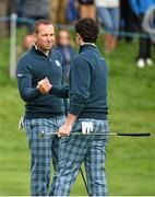 23 September 2014; Sergio Garcia and Rory McIlroy on the 18th green after their round during the European teams practice. Previews of the 2014 Ryder Cup Matches. Gleneagles, Scotland. Picture credit: Matt Browne / SPORTSFILE