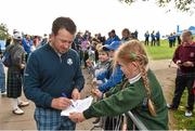23 September 2014; Graeme McDowell signs autographs on his way to the 11th tee box during the European teams practice. Previews of the 2014 Ryder Cup Matches. Gleneagles, Scotland. Picture credit: Matt Browne / SPORTSFILE