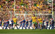 21 September 2014; Donegal captain Michael Murphy, centre, and his team-mates break away early from the pre-match parade. GAA Football All Ireland Senior Championship Final, Kerry v Donegal. Croke Park, Dublin. Picture credit: Piaras Ó Mídheach / SPORTSFILE
