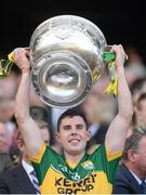21 September 2014; Kerry's Michael Geaney lifts the Sam Maguire cup. GAA Football All Ireland Senior Championship Final, Kerry v Donegal. Croke Park, Dublin. Picture credit: Stephen McCarthy / SPORTSFILE