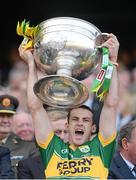 21 September 2014; Kerry's Shane Enright lifts the Sam Maguire cup. GAA Football All Ireland Senior Championship Final, Kerry v Donegal. Croke Park, Dublin. Picture credit: Stephen McCarthy / SPORTSFILE