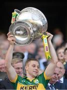 21 September 2014; Kerry's Peter Crowley lifts the Sam Maguire cup. GAA Football All Ireland Senior Championship Final, Kerry v Donegal. Croke Park, Dublin. Picture credit: Stephen McCarthy / SPORTSFILE