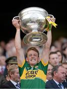 21 September 2014; Kerry's Donnchadh Walsh lifts the Sam Maguire cup. GAA Football All Ireland Senior Championship Final, Kerry v Donegal. Croke Park, Dublin. Picture credit: Stephen McCarthy / SPORTSFILE