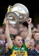 21 September 2014; Kerry's Darran O'Sullivan lifts the Sam Maguire cup. GAA Football All Ireland Senior Championship Final, Kerry v Donegal. Croke Park, Dublin. Picture credit: Stephen McCarthy / SPORTSFILE