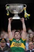 21 September 2014; Kerry's Aidan O'Mahony lifts the Sam Maguire cup. GAA Football All Ireland Senior Championship Final, Kerry v Donegal. Croke Park, Dublin. Picture credit: Stephen McCarthy / SPORTSFILE