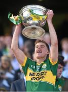 21 September 2014; Kerry's Ivan Parker lifts the Tom Markham cup. Electric Ireland GAA Football All Ireland Minor Championship Final, Kerry v Donegal. Croke Park, Dublin. Picture credit: Stephen McCarthy / SPORTSFILE