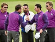 24 September 2014; Team Europe's Graeme McDowell and Rory McIlroy shake hands on the eighteenth green after their round, during European Team practice. Previews of the 2014 Ryder Cup Matches. Gleneagles, Scotland. Picture credit: Matt Browne / SPORTSFILE
