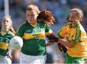 21 September 2014; Eva O’Sullivan, Scoil Mhuire NS, Co. Cork, representing Kerry, in action against Megan Delaney, Bekan PS, Co. Mayo, representing Donegal, during the INTO/RESPECT Exhibition GoGames. Croke Park, Dublin. Picture credit: Stephen McCarthy / SPORTSFILE